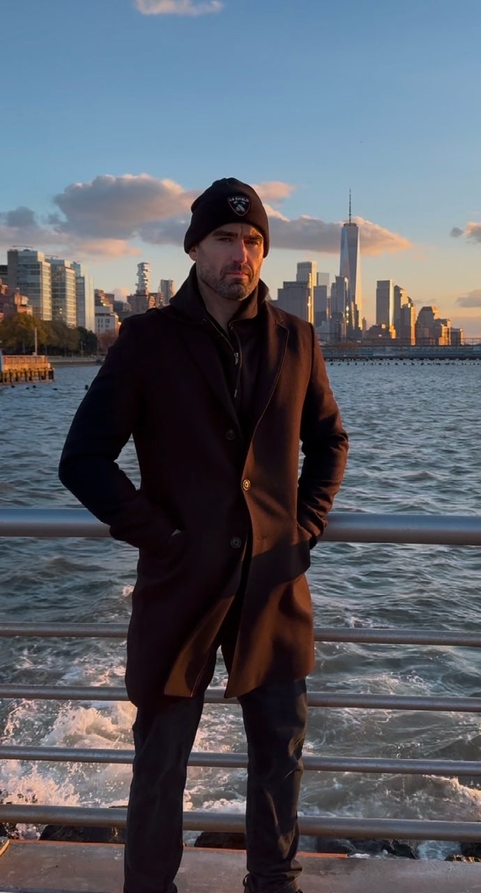 The New York city Freedom tower and crashing waves of the Hudson River. This high quality made in the United States of America beanie will keep you warm as you explore NYC in the winter.